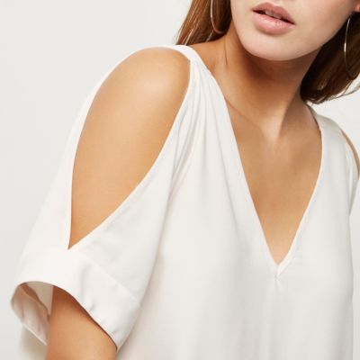 Cream cold shoulder blouse